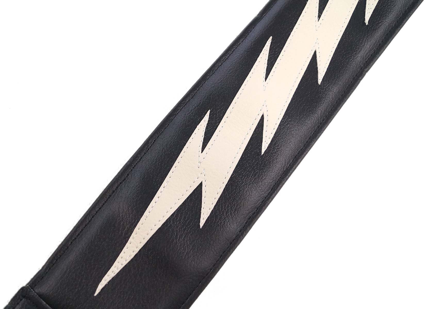 Close-up of the wide lightning bolt pattern on the 3 inch padded strap