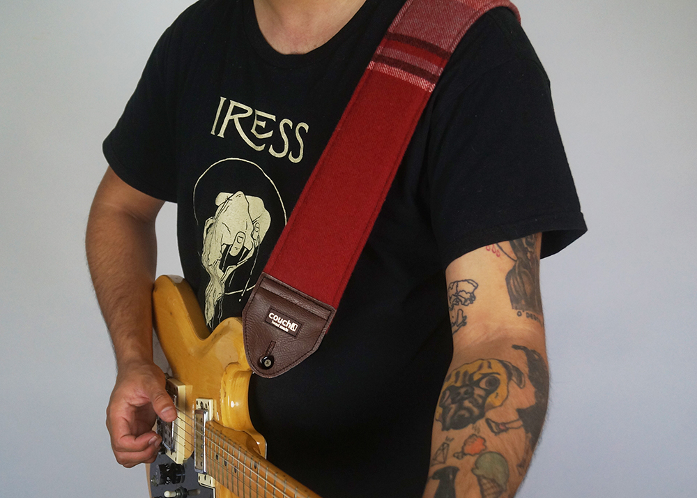 The Scout Caravan strap worn on a guitar
