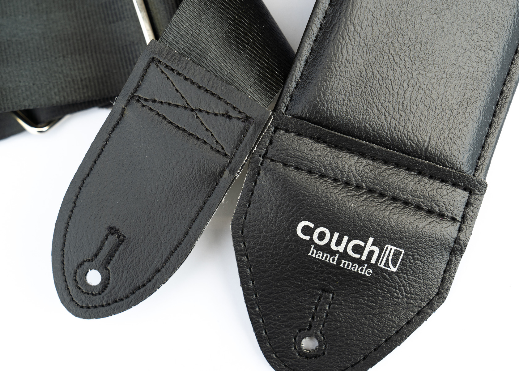 Close-up of the end tabs and quilted double-fold padding stitching