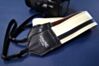The Couch White w/ Black Racer X Camera Strap 