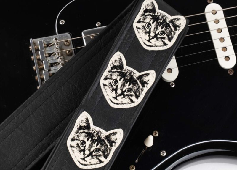 The Couch Cat Guitar Strap- Black With White Cats