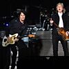 Rusty Anderson of Paul McCartney band with special modified 3 inch strap. 