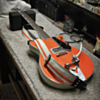 White with Orange Vinyl Racer X Guitar Strap