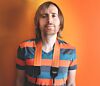 The Industrial Orange Recycled Seat Belt Camera Strap
