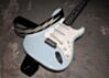 Fender Stratocaster with bolt guitar strap