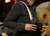 The Couch White and Orange Racer X Camera Strap