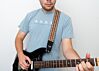 guitar player with COUCH vintage guitar strap