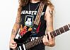 Female Guitar player with vintage style guitar strap from COUCH