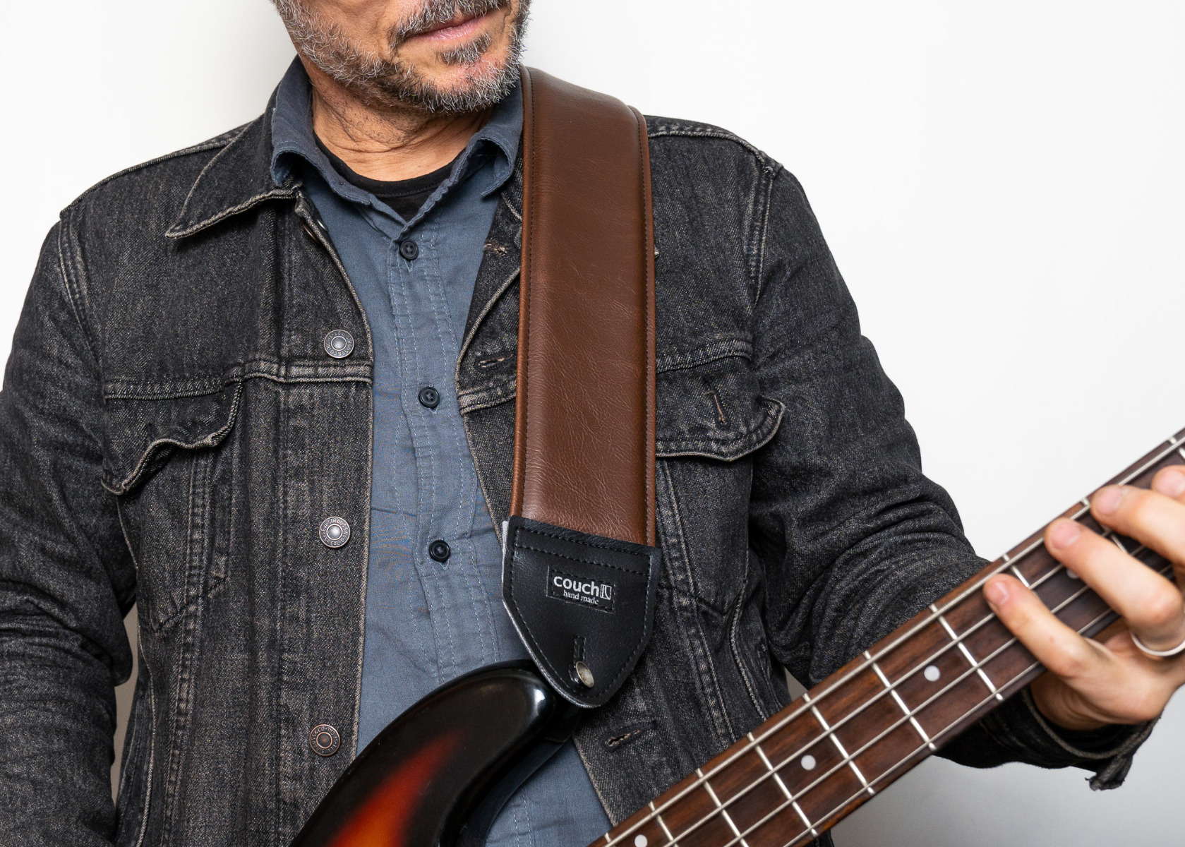 The classic brown 3 inch strap worn on a bass