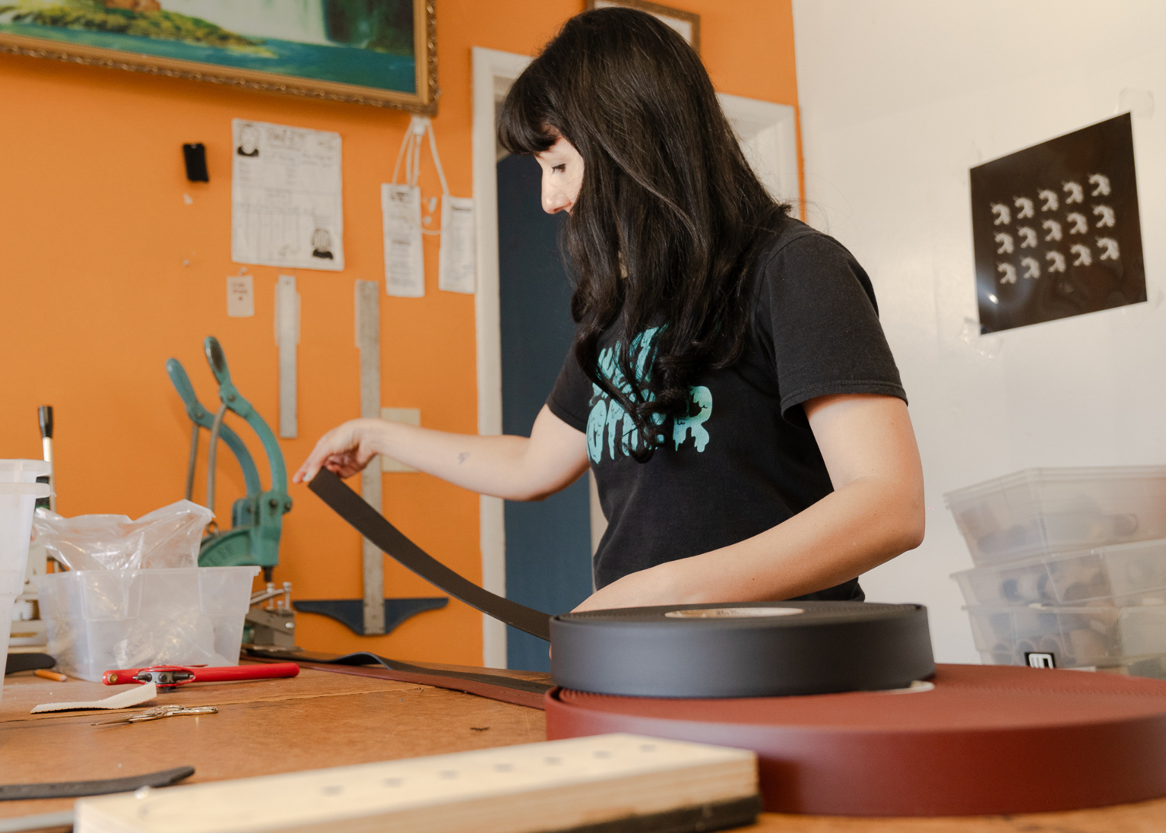 A Couch belt being cut by hand in the Couch workshop