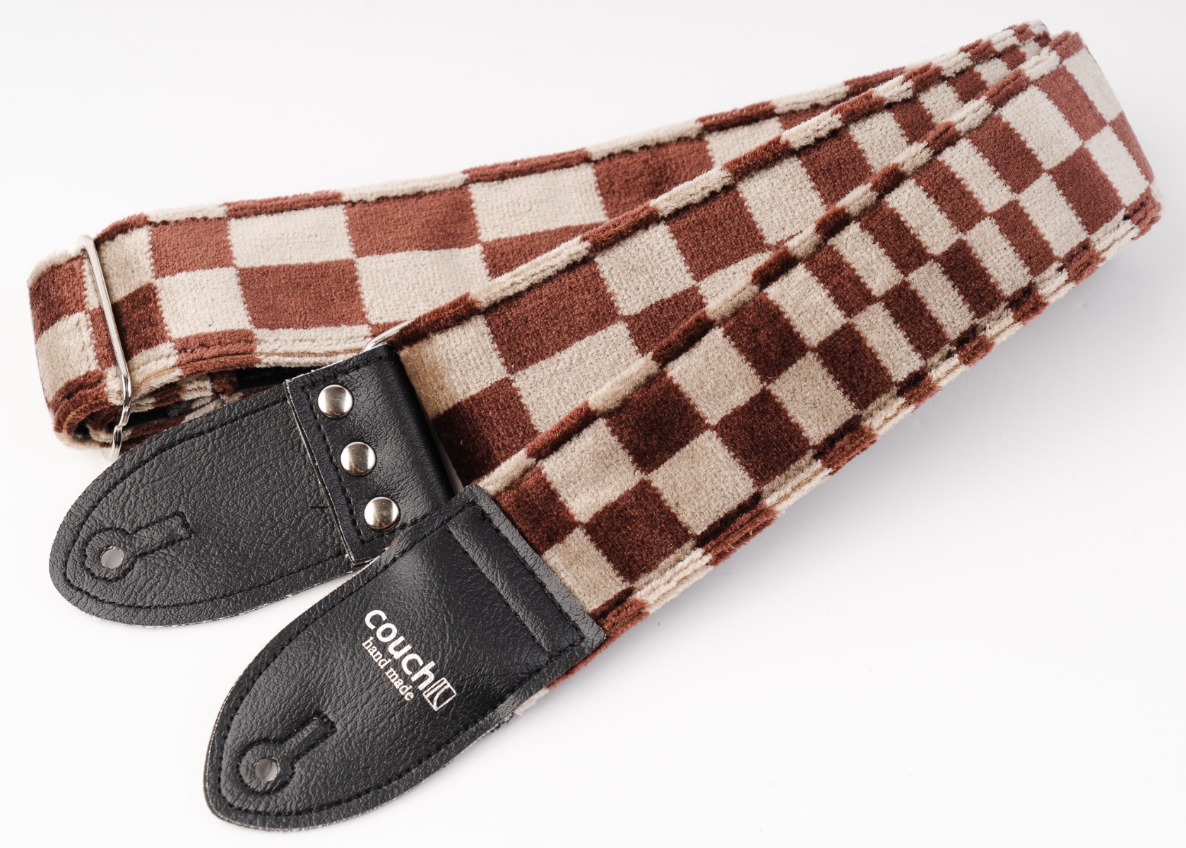 Reinforced triple-riveted leather ends and forged steel hardware on The Pasha strap