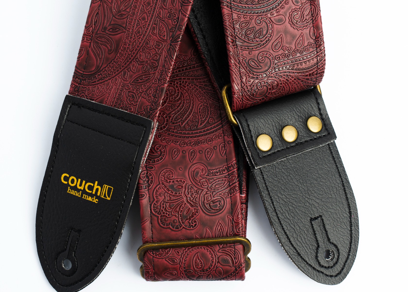 Full view of the embossed oxblood paisley vinyl strap with both black end tabs