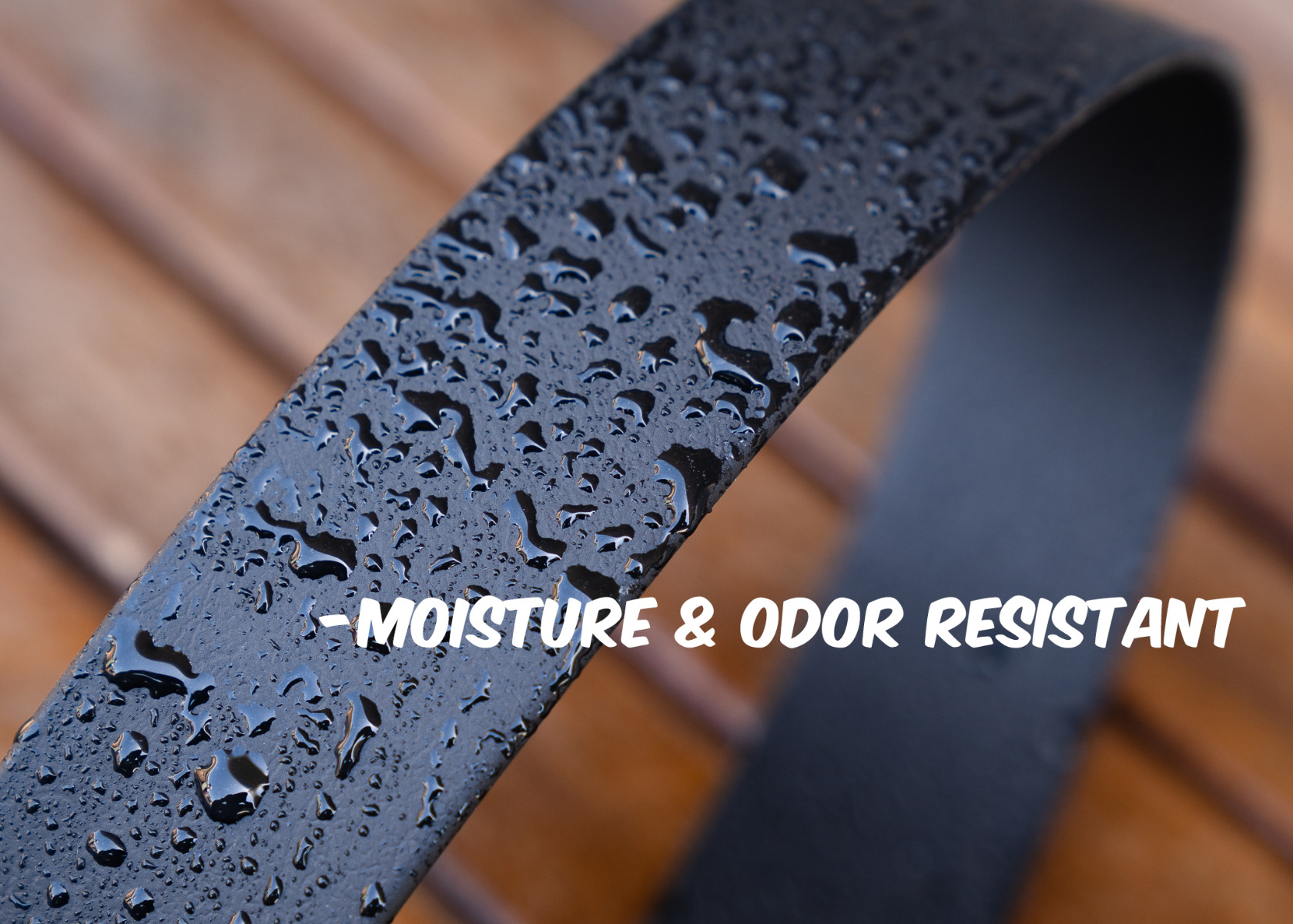 Water beading on the surface of a BioThane belt, showing its moisture resistance