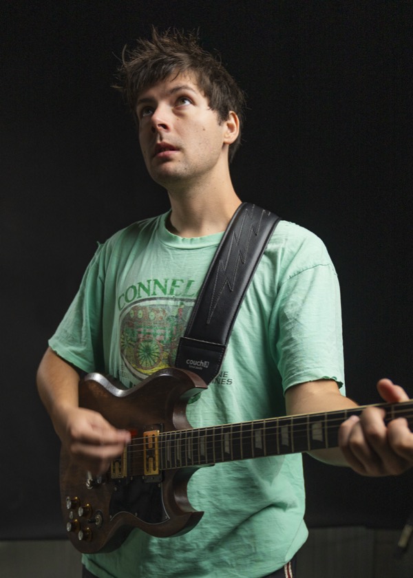 Small 3 inch guitar and bass strap at its middle setting, about 42 inches, on a 5 ft 9 in model