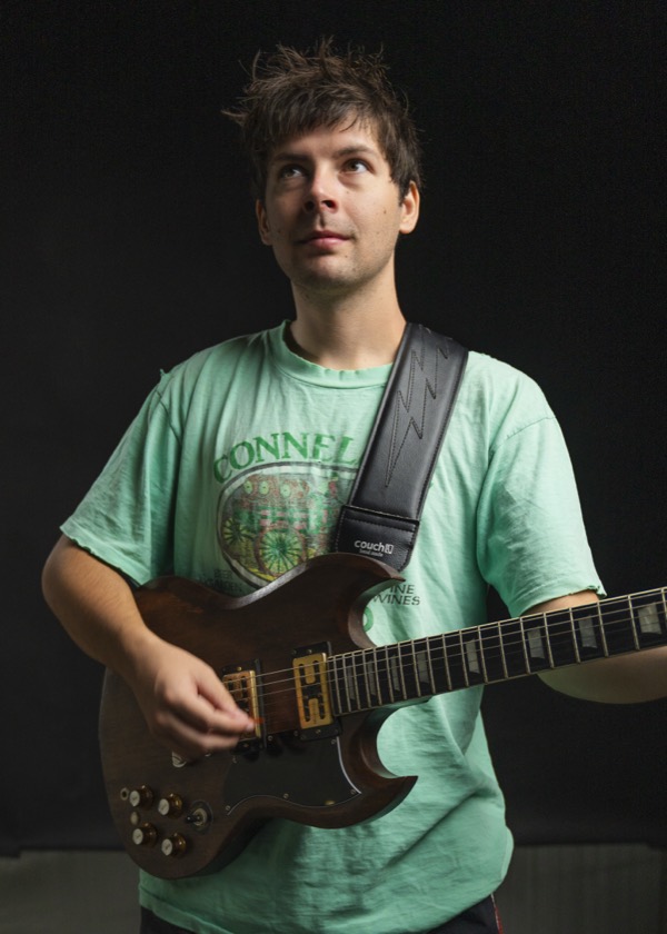 Small 3 inch guitar and bass strap at its shortest setting, 39.5 inches, on a 5 ft 9 in model