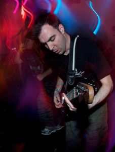 Scott_crouse_earth_crisis_couch_guitar_straps