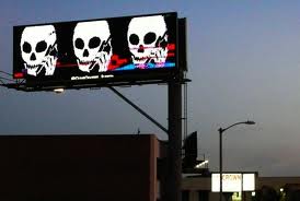 Skullphone Billboard Hovers Above The 90 Freeway In Los Angeles