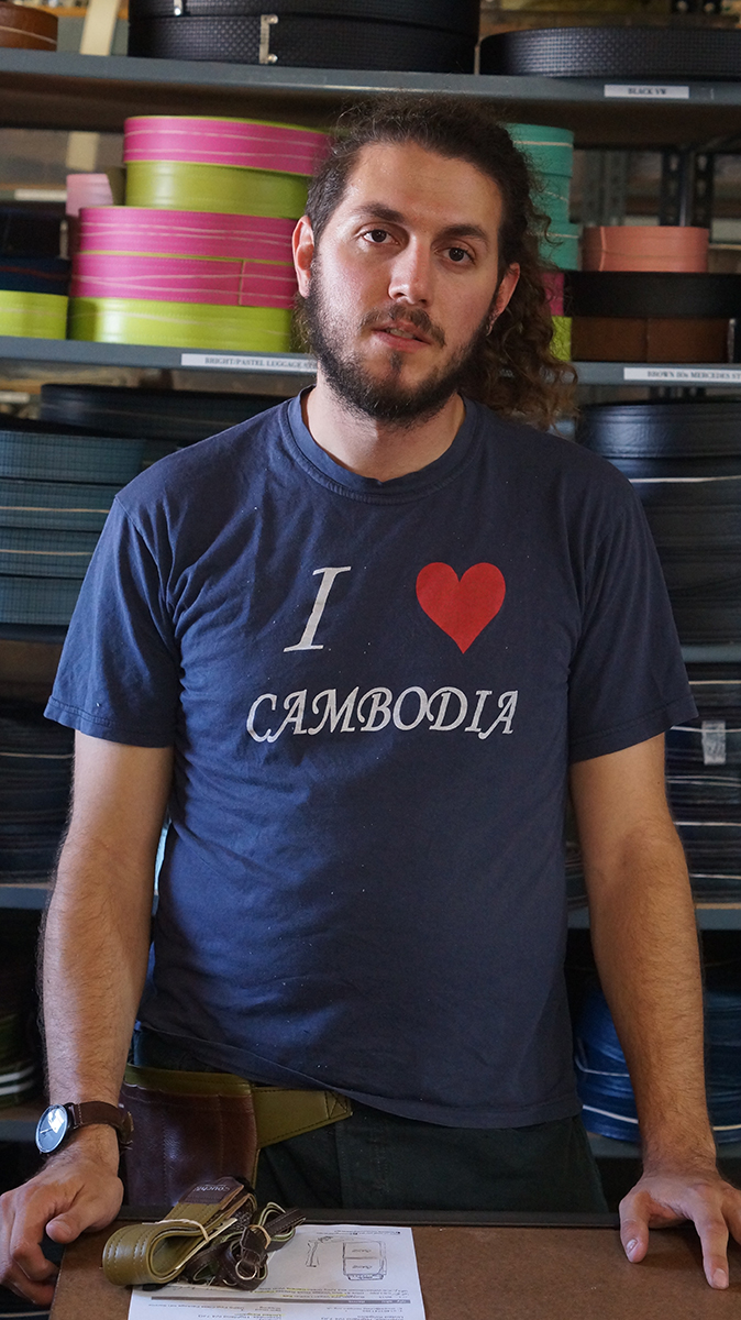 mitch_small MITCH ROUSER <br>PRODUCTION ASSISTANT <br>Mitch makes furniture and sews already so we were like, hey you should come work with us. Mitch lays the foundation of assembly used to built your straps running double needle machines, die cutters , heat cutters….. Mitch loves falafel.