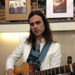 Brian Bell Of Weezer With GTO Strap